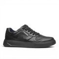 ShoeShop Pegada black leather sneakers with perforated detailing, textile lining, and a comfortable EVA sole.
