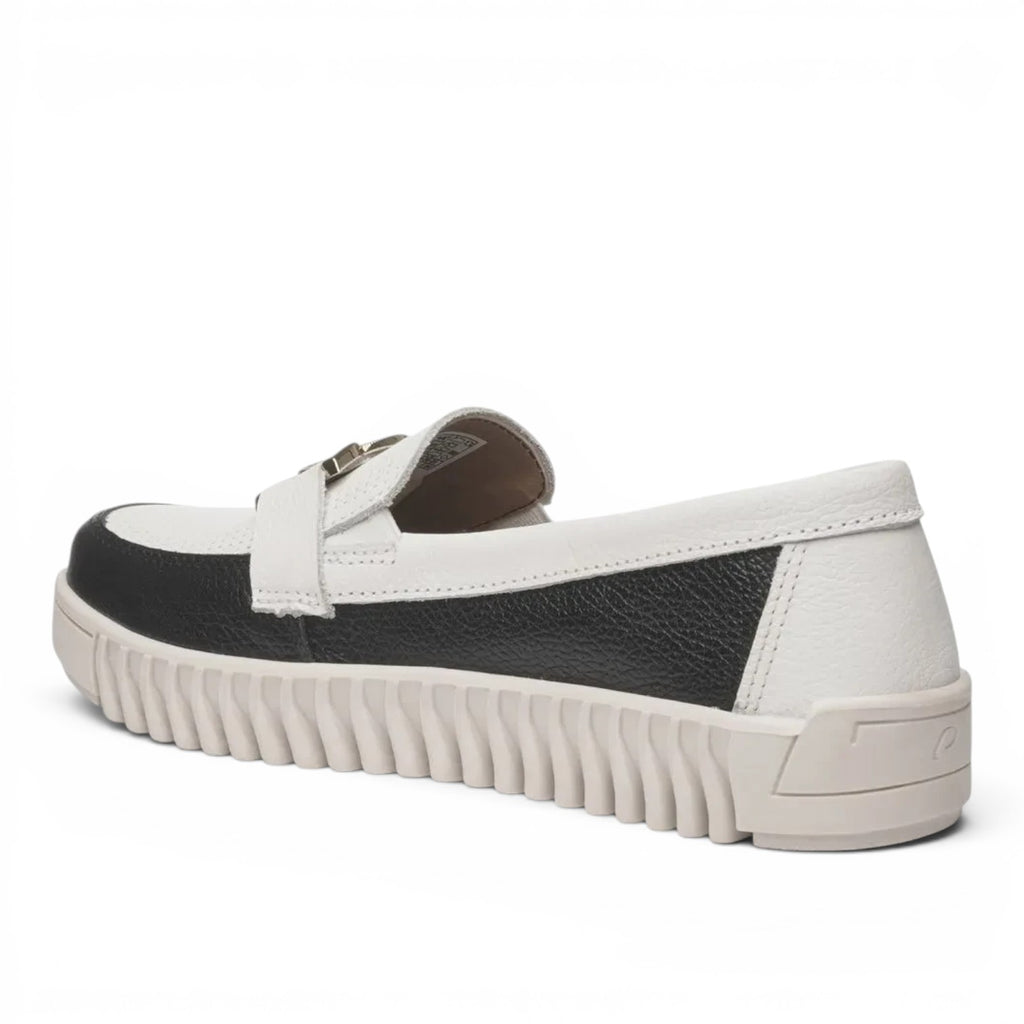 ShoeShop Pegada black and white leather loafer with a chunky ribbed platform sole, side view
