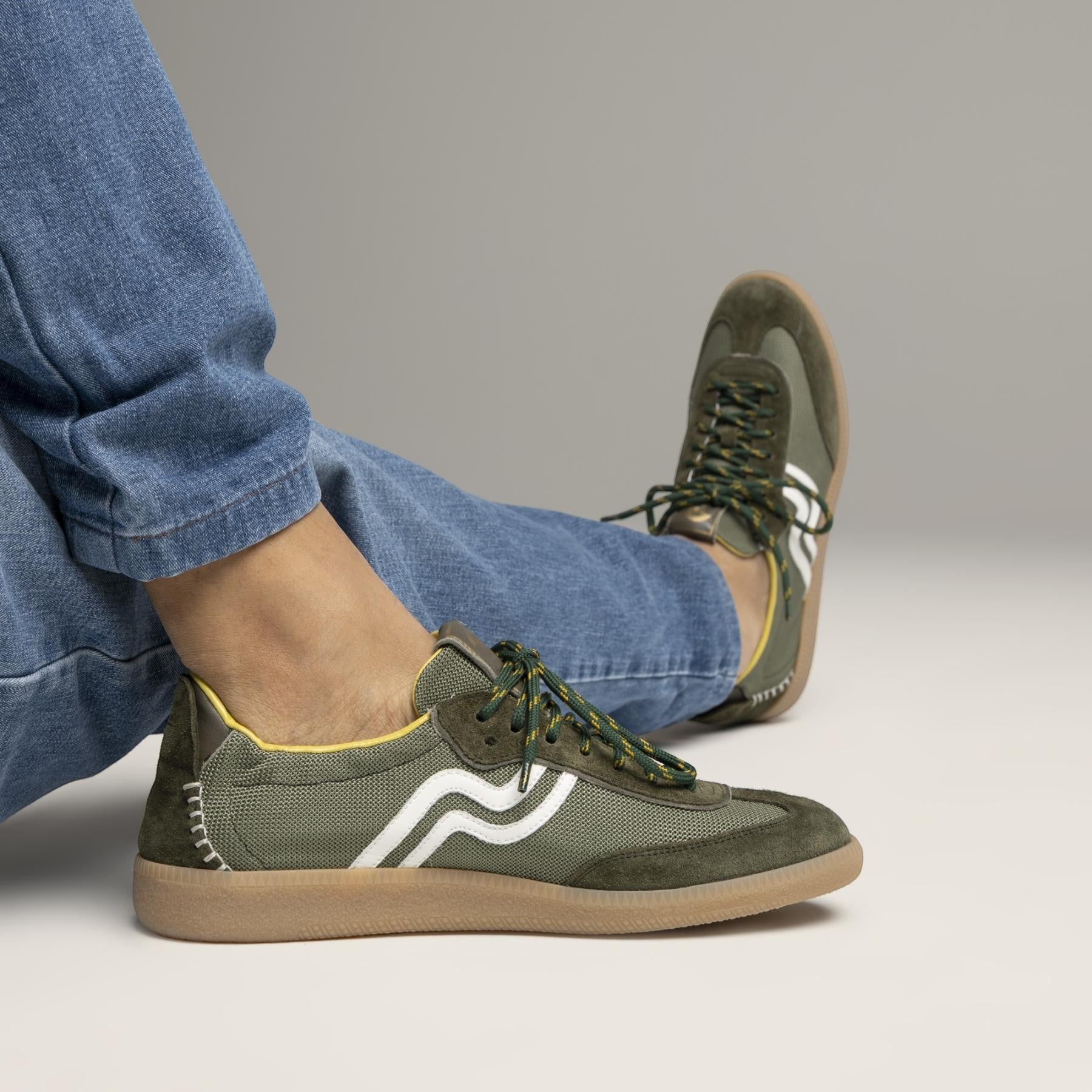 ShoeShop Primabase 51451 Borg retro-style olive green sneakers with white side detail and gum rubber soles.
