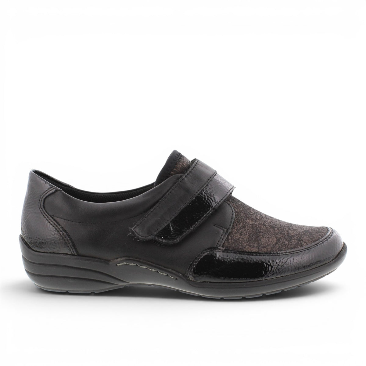 ShoeShop Remonte R7600-03 black casual shoe with a textured metallic panel and convenient hook-and-loop strap closure.