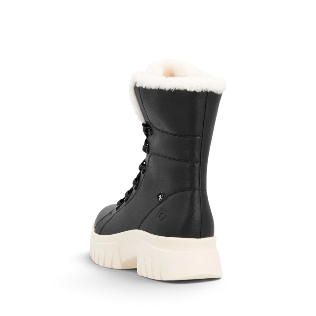 ShoeShop Rieker W1874-00 black winter boots with white faux fur lining and chunky platform sole, rear view