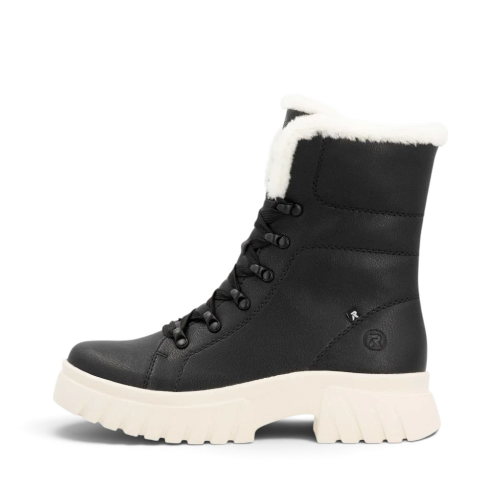 ShoeShop Rieker W1874-00 black winter boots with white faux fur lining and a chunky lug sole