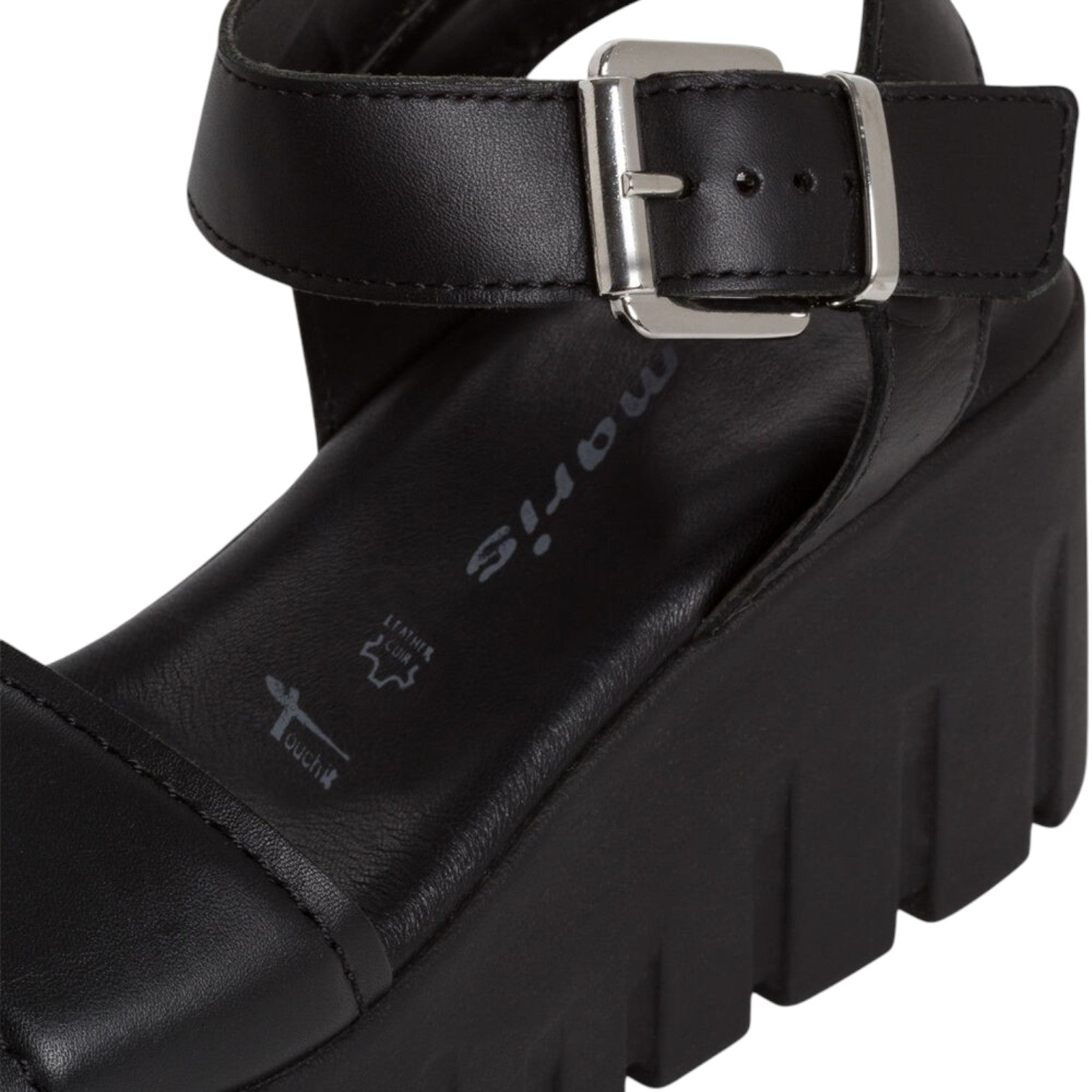 ShoeShop Tamaris black leather platform sandal with an adjustable ankle strap and chunky lug sole
