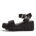 ShoeShop Tamaris black platform sandals with a chunky lug sole and adjustable ankle strap buckle