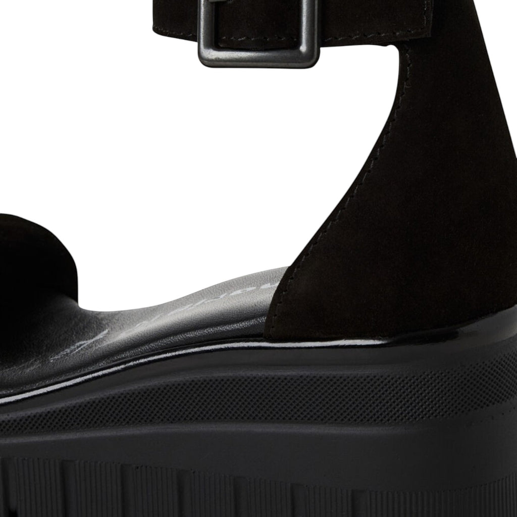 ShoeShop Tamaris black suede platform sandal with an adjustable ankle strap and chunky textured sole