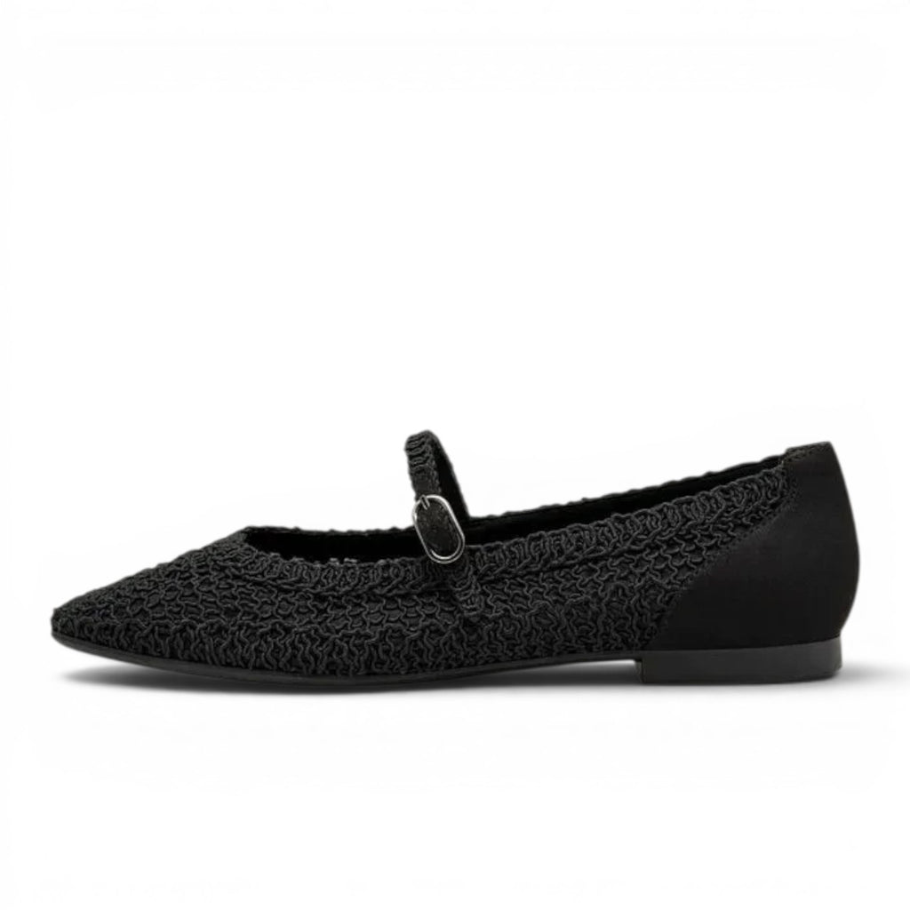 ShoeShop Tamaris black textile ballet flats with a textured upper, pointed toe, and a delicate buckled strap.
