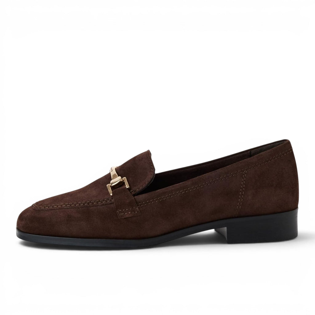 ShoeShop Tamaris dark brown suede loafers with a gold-tone metal bit detail and a flat rubber sole.