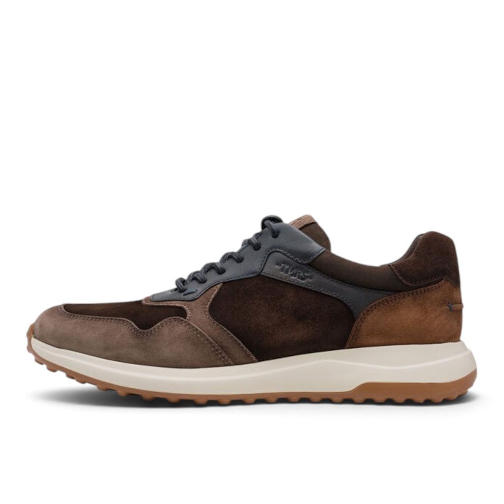 ShoeShop Tamaris brown suede and leather low-top sneaker with a white cushioned midsole and textured rubber sole
