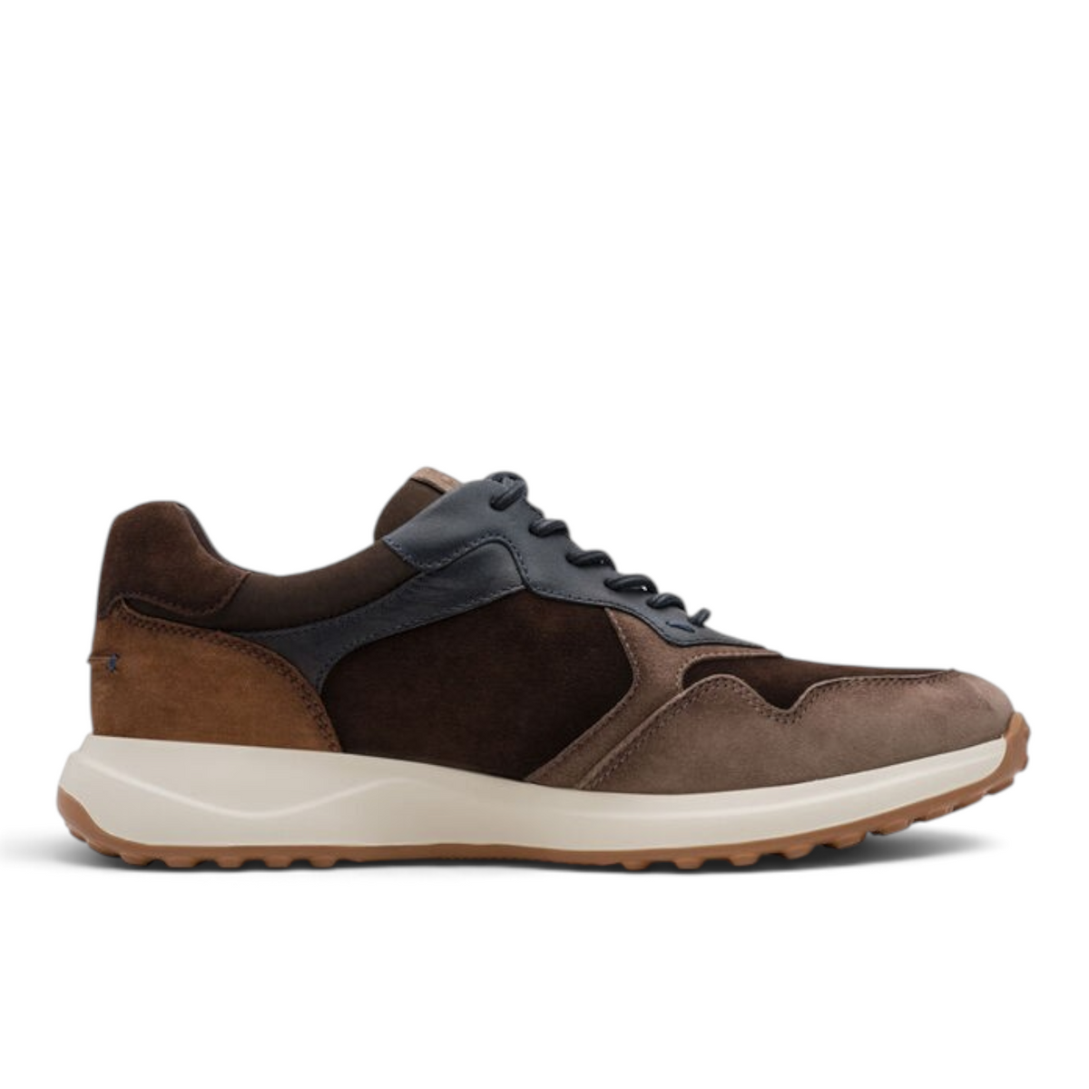 ShoeShop Tamaris brown suede and leather sneakers with a white cushioned midsole and textured gum rubber outsole