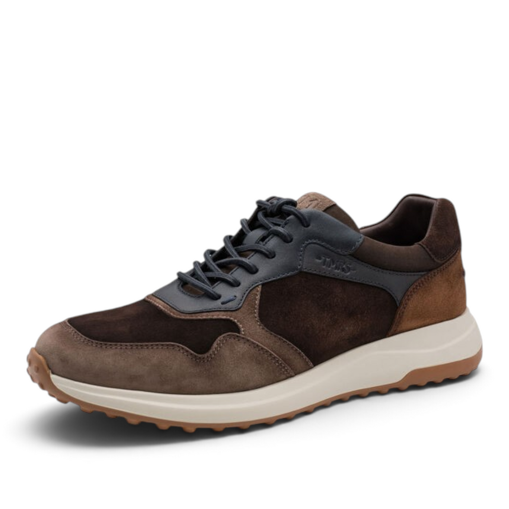 ShoeShop Tamaris brown suede and leather sneakers with a white cushioned sole and lace-up closure