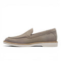 ShoeShop Tamaris grey leather slip-on loafers with a white flat sole and side logo detail