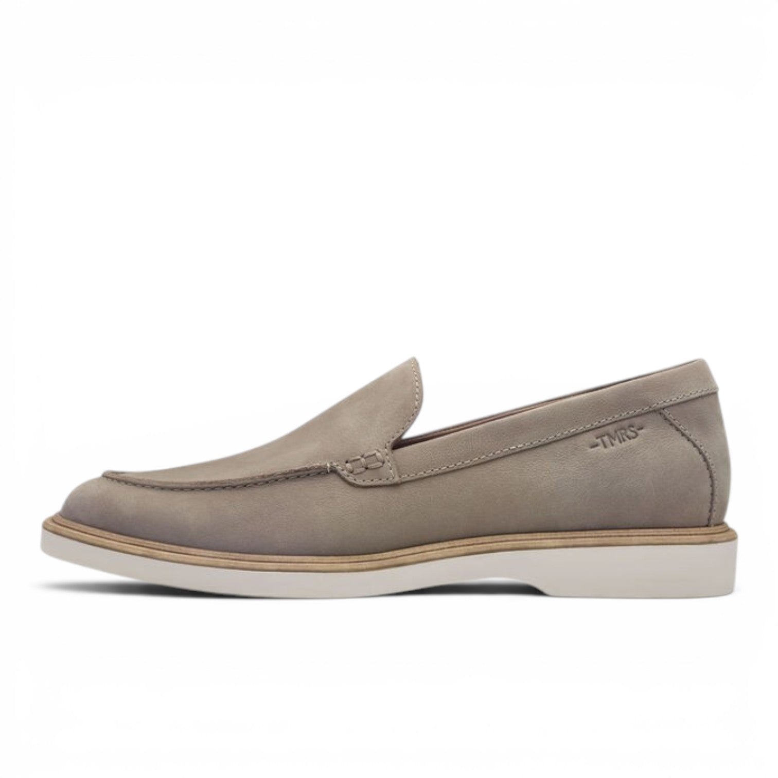 ShoeShop Tamaris grey leather slip-on loafers with a white flat sole and side logo detail