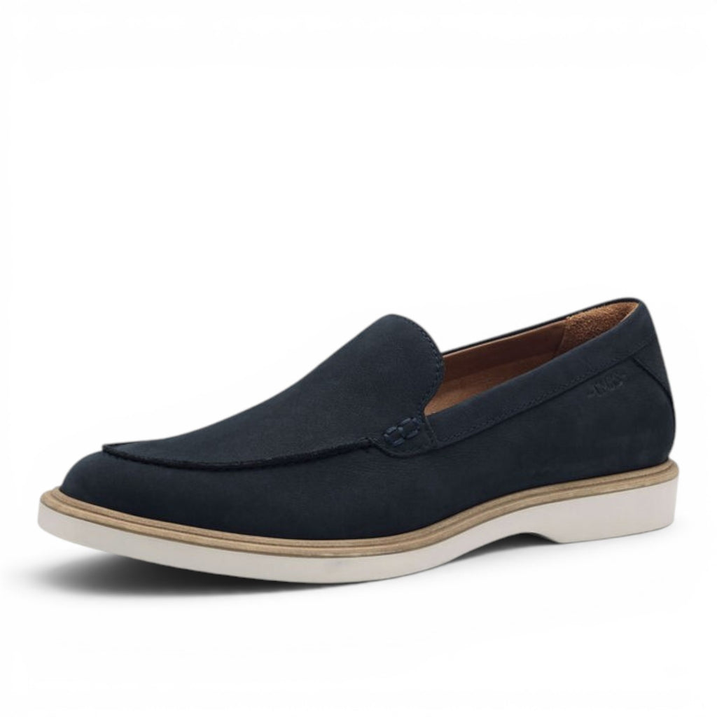 ShoeShop Tamaris navy blue suede loafers with a white flat sole, featuring a classic slip-on design.