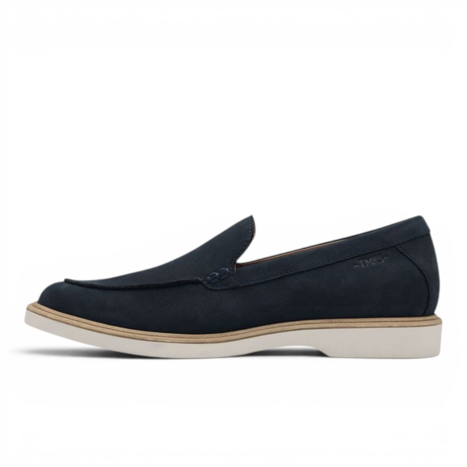 ShoeShop Tamaris navy blue suede slip-on loafers with a white flat sole