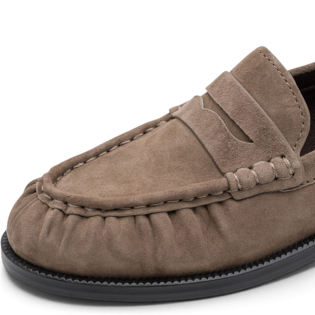 ShoeShop Tamaris suede penny loafer in taupe with a durable rubber sole and moccasin-style stitching