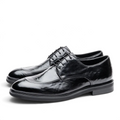 ShoeShop TARGO black leather lace-up dress shoes with a polished finish and classic apron toe design
