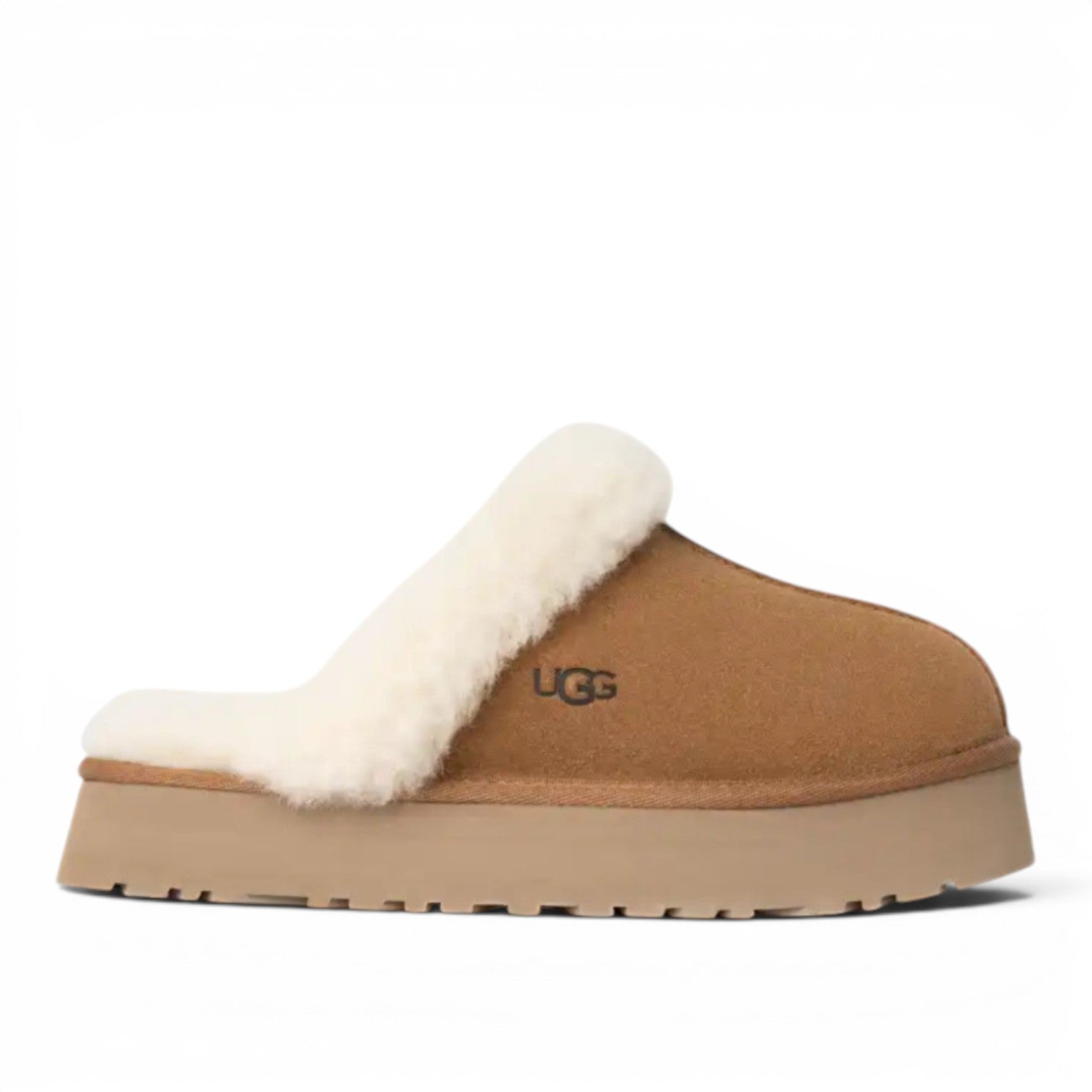 ShoeShop UGG tan suede slip-on clogs with cream sheepskin lining and 3cm platform sole.