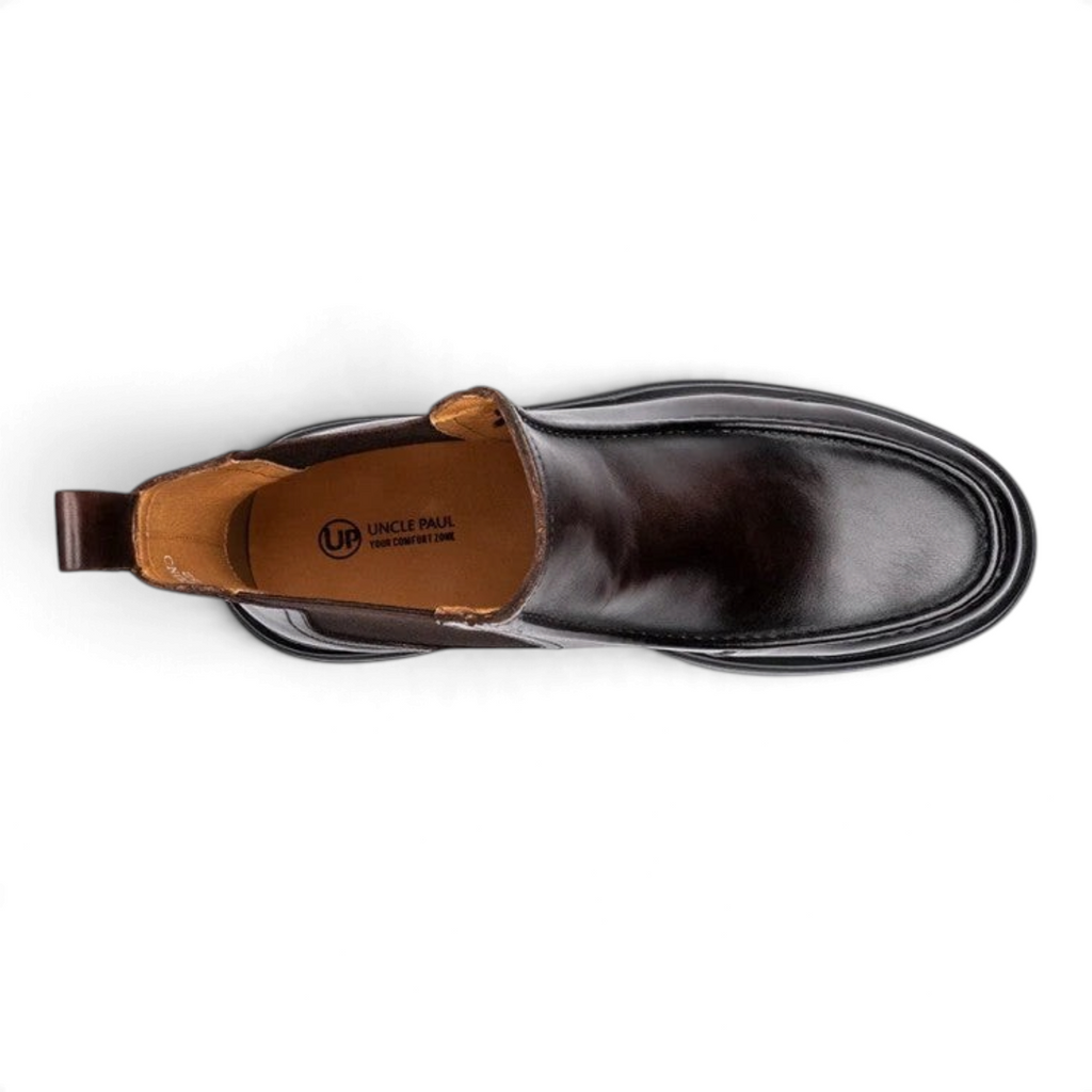 ShoeShop KUUNO dark brown leather ankle boot viewed from above showing the smooth finish and pull tab