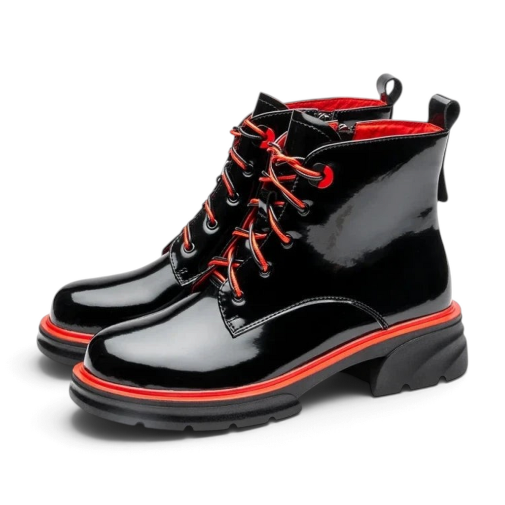 ShoeShop Uncle Paul MARIA black patent leather lace-up ankle boots with vibrant red accents and chunky rubber soles.
