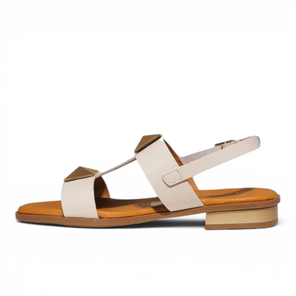 ShoeShop Oh My Sandals 5595 in white leather with gold pyramid stud accents and a low block heel, side view.