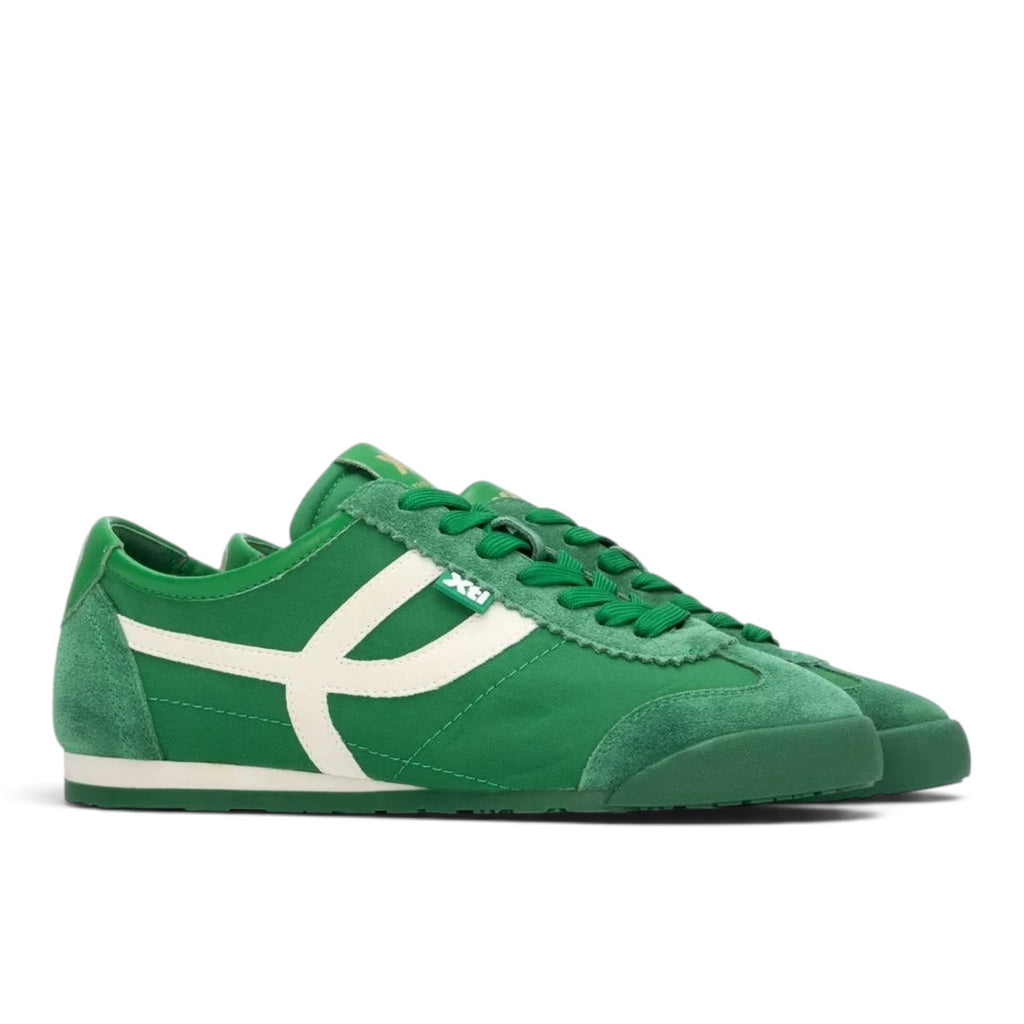 ShoeShop XTI 145218 green sneakers with white side detailing and suede overlays on a white background