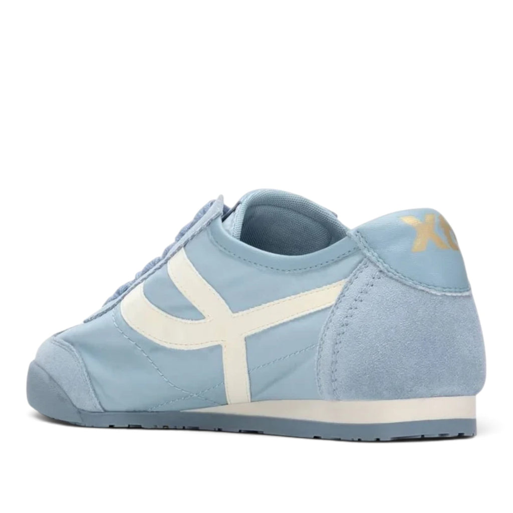 ShoeShop XTI 145218 light blue low-top sneakers with white side stripes and suede detailing