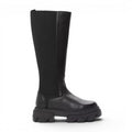 ShoeShop black leather knee-high boots with elasticated shaft and chunky lug sole.