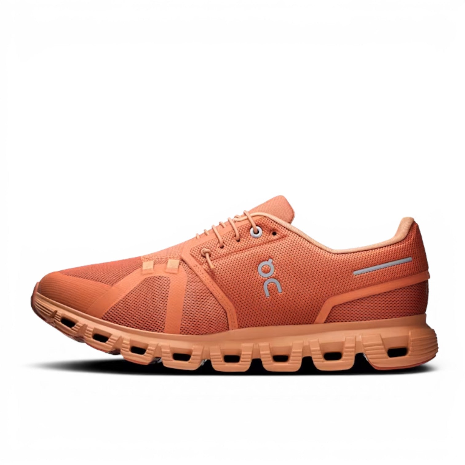 ShoeShopHere orange mesh ON Cloud 6 running shoe with grey logo and reflective heel detail. Lightweight and comfortable for all-day wear.