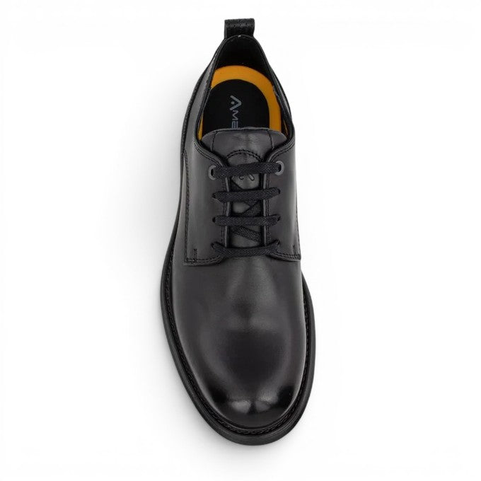 ShoeShop black leather derby shoes with lace-up closure and yellow interior.