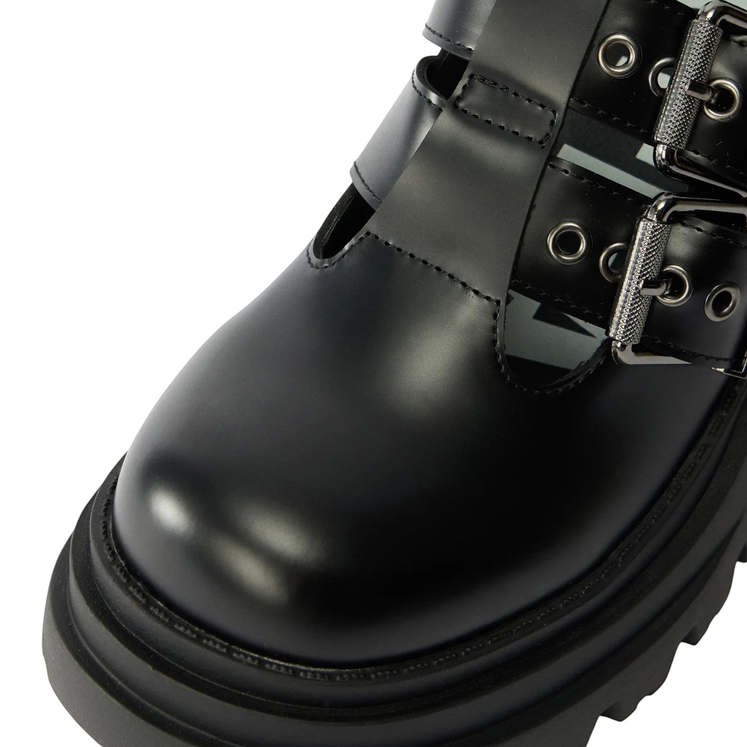 ShoeShop black faux leather platform shoes with double buckle straps and chunky sole.