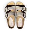 ShoeShop Twin Island white leather crocodile-embossed double buckle slide sandals with adjustable straps.