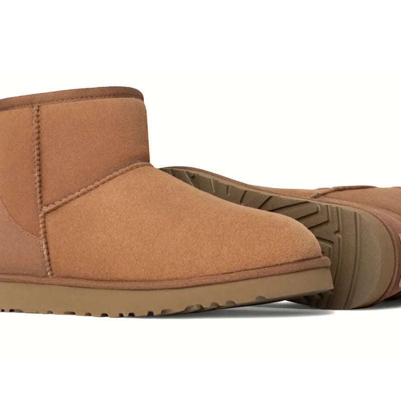 ShoeShop UGG Classic Mini Boot in tan suede with sheepskin lining and sugarcane EVA sole.